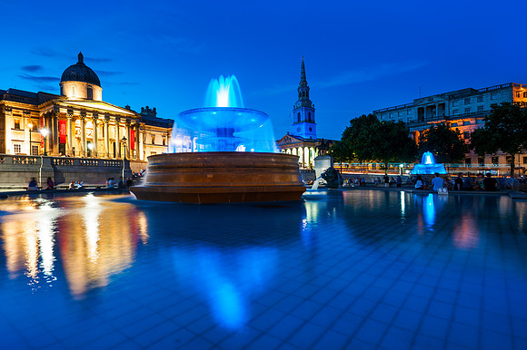 London - Trafalgar Square Fountains turn Blue for the Royal Baby Boy
