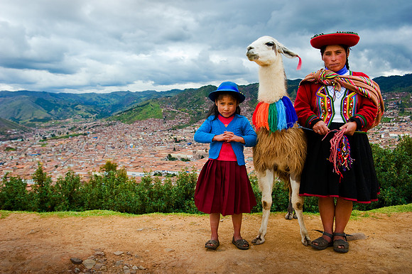 Cusco - Quechua Woman and Child with View to the City